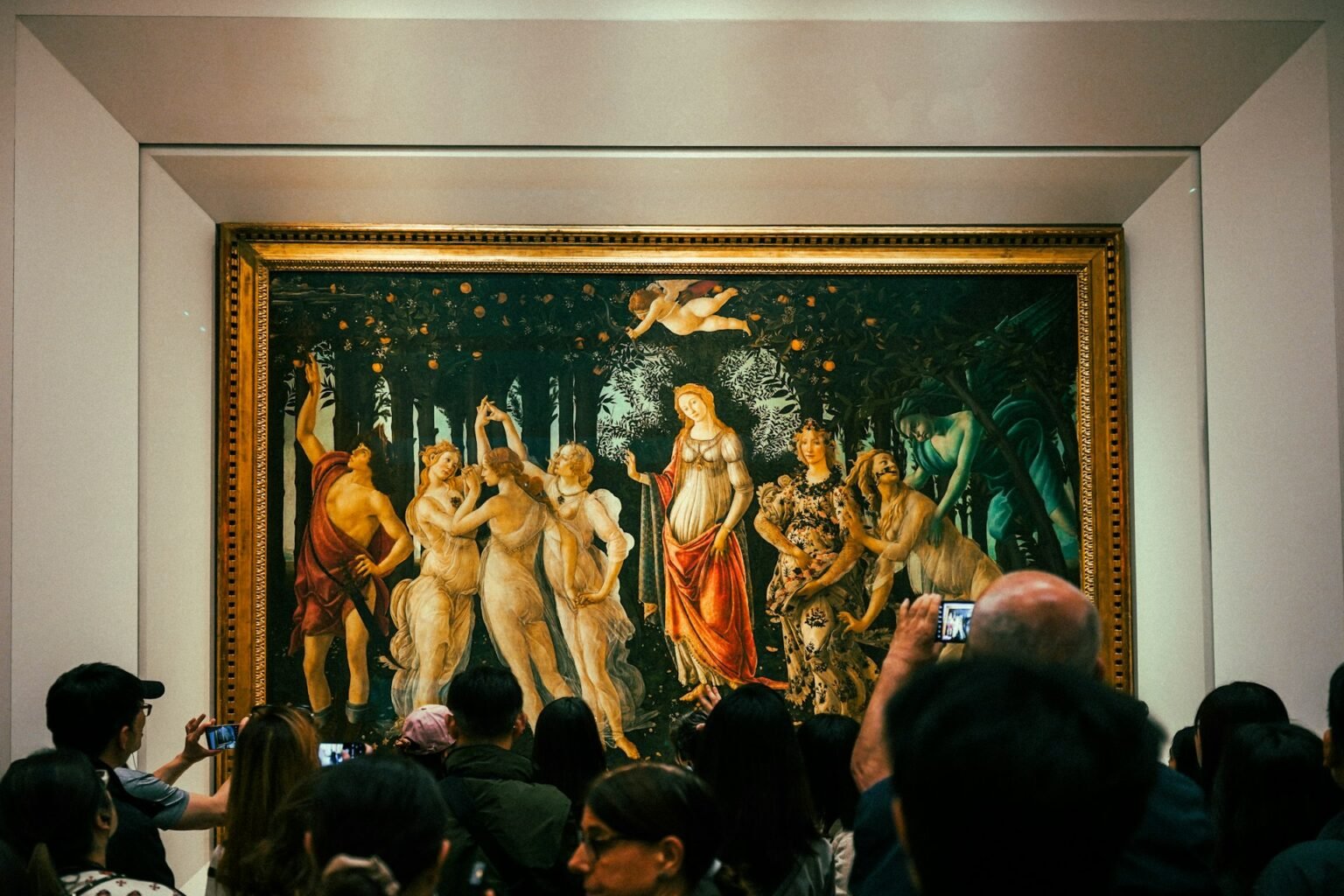 Visitors admiring Botticelli’s Primavera at the Uffizi