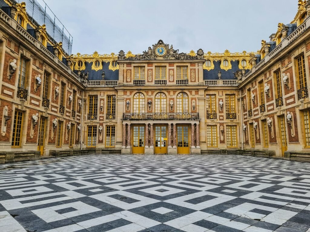 The Marble Courtyard of the Palace of Versailles